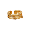Bague Sirius - anneaux dorés premium superposés cristaux en étoile