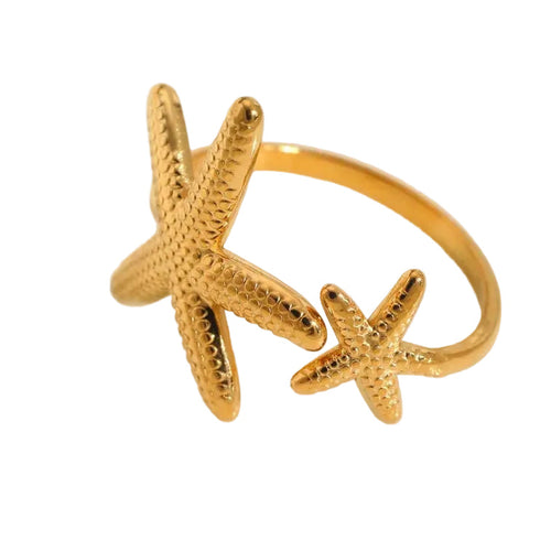 Bague Escalet - deux étoiles de mer dorées premium texture granulée